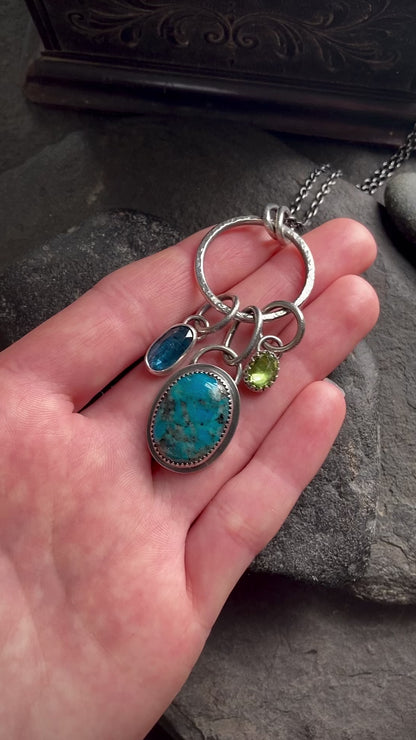 Bright Blue Turquoise Charm Necklace with Teal Kyanite & Peridot | Sterling Silver Charm Necklace featuring Gorgeous Kingman Turquoise
